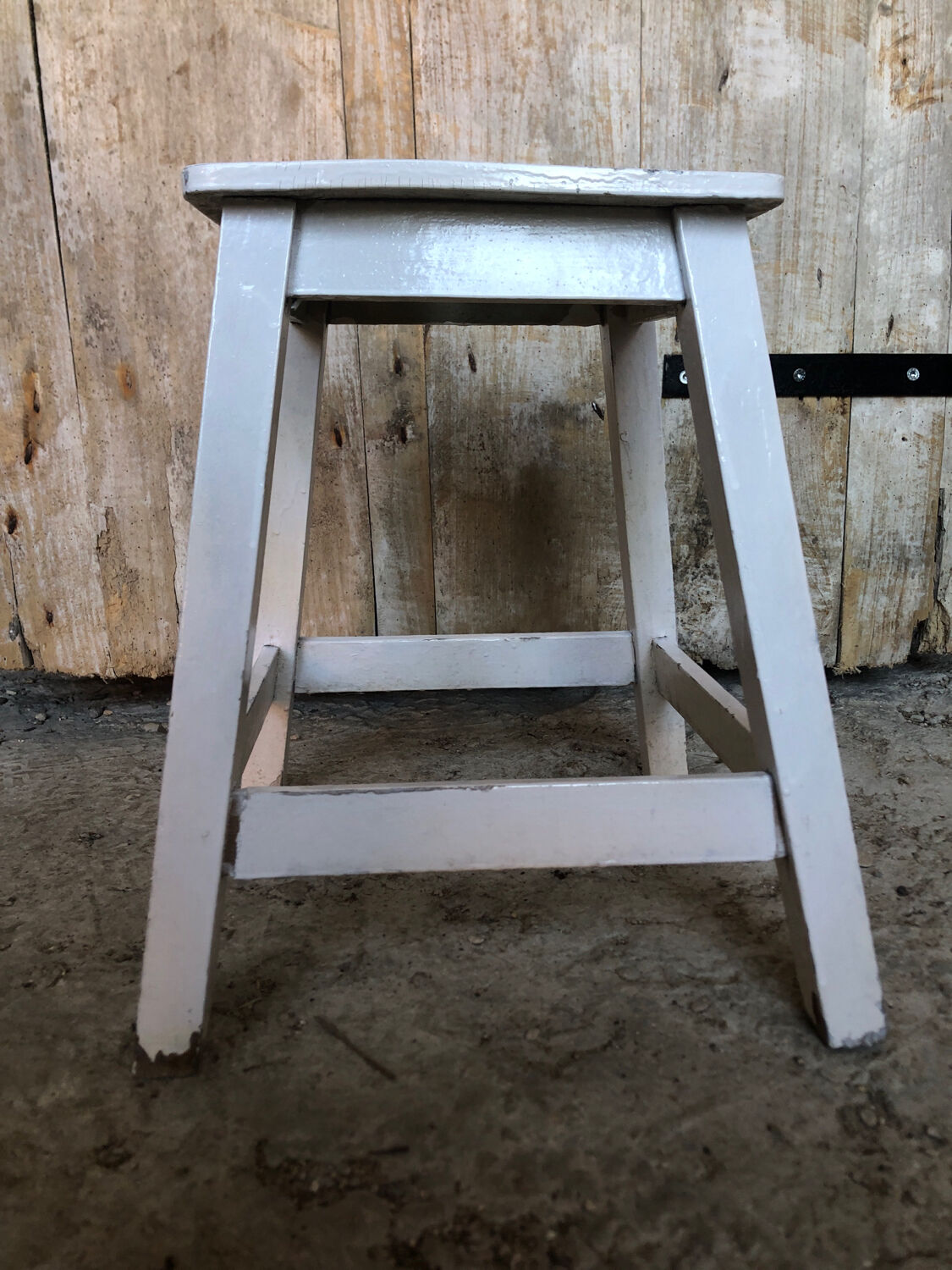 Vintage white wood milking stool