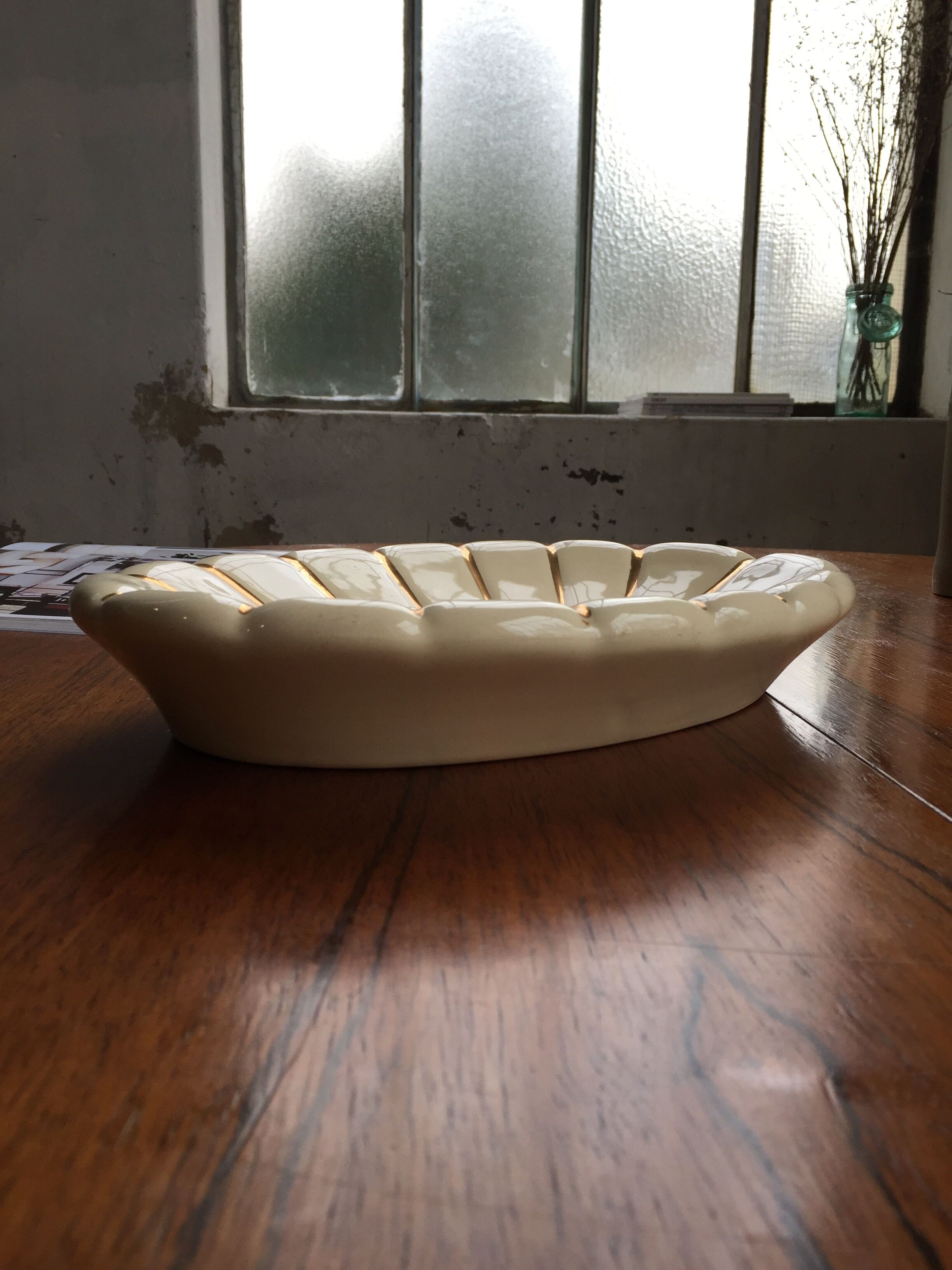 White and gold ceramic plate