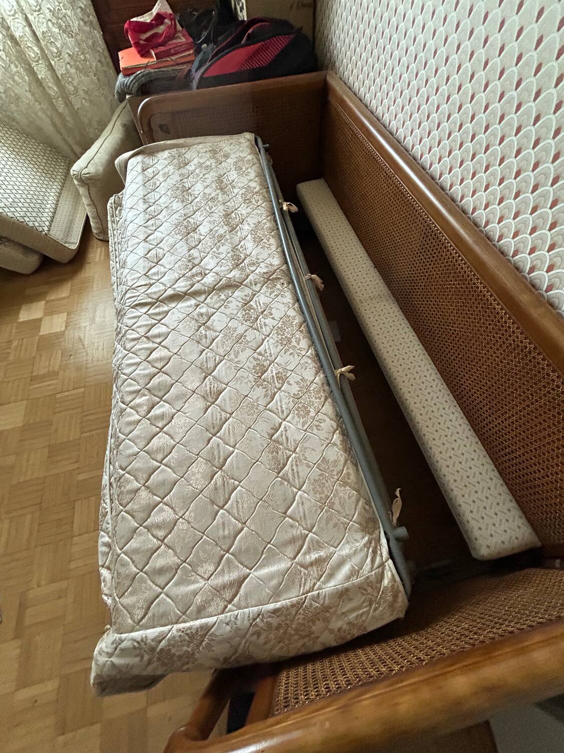Vintage convertible wooden and cane sofa