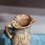 Pitcher signed Eugène Lion