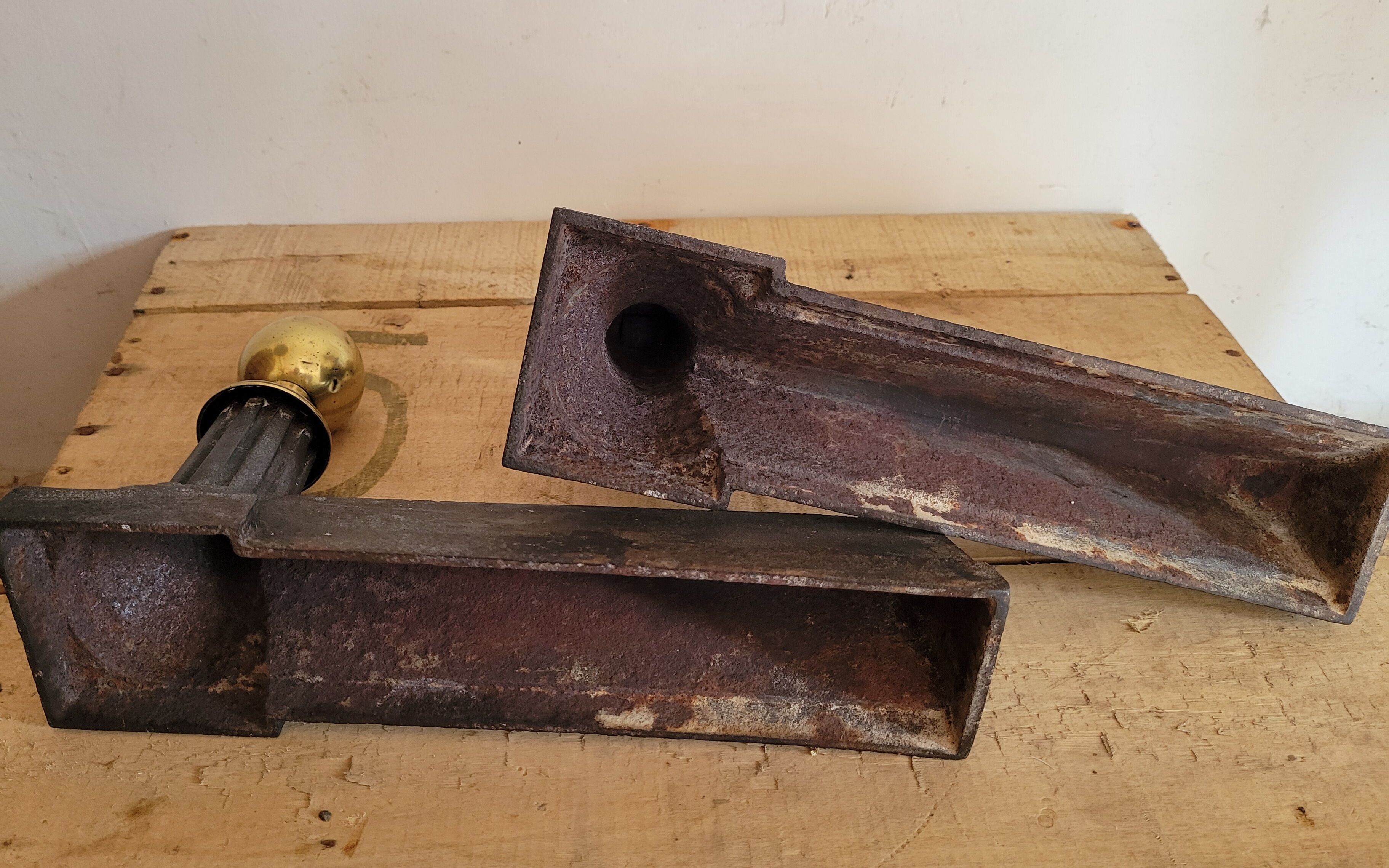 Pair of cast iron and brass chenets