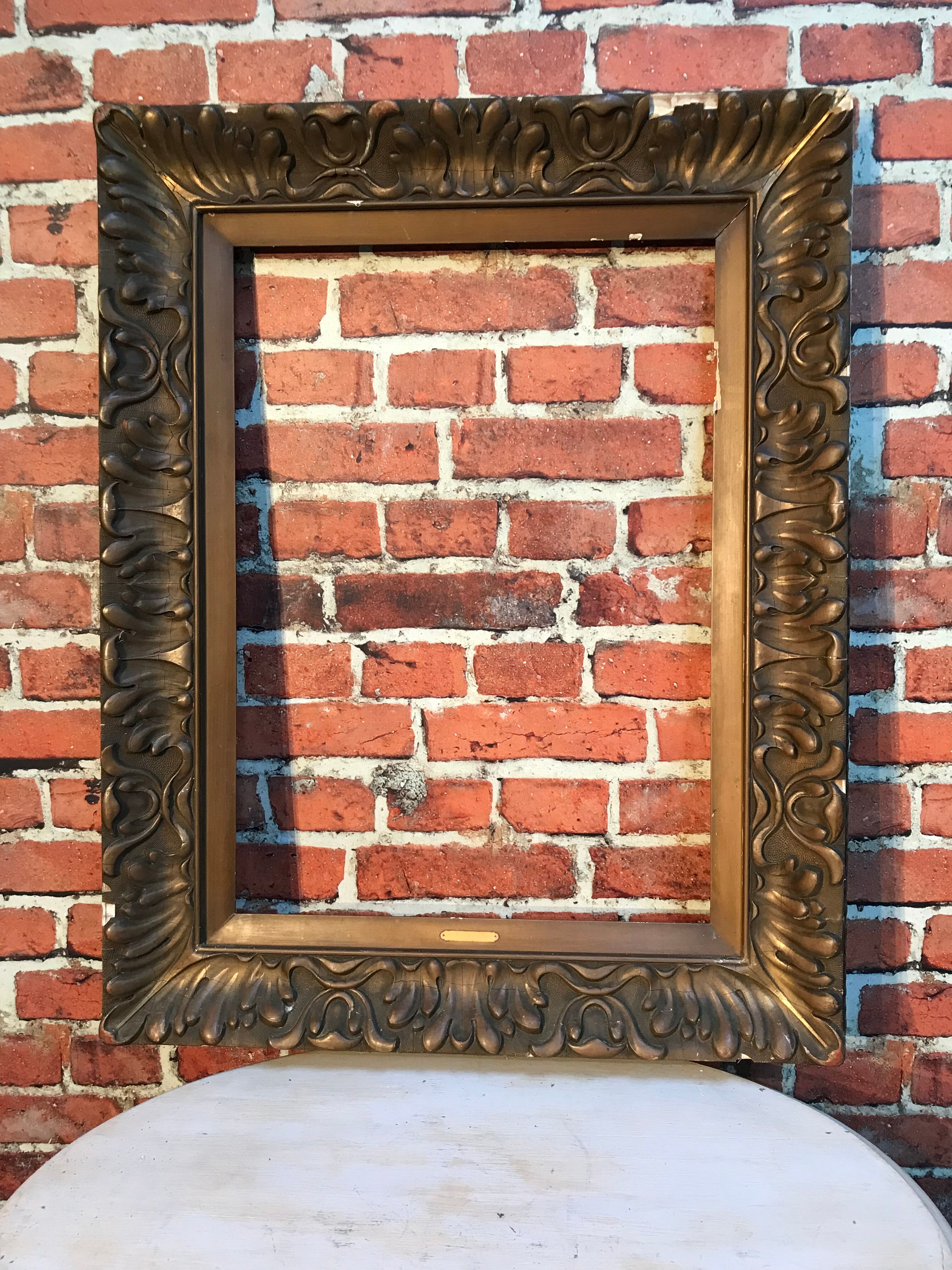 Wooden frame and stucco moldings