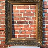 Wooden frame and stucco moldings