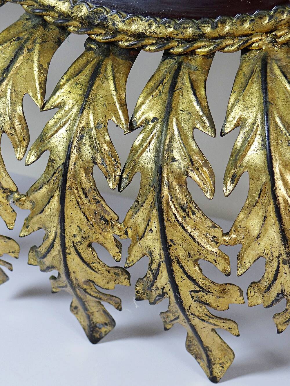 Large Italian sunburst wall mirror in gilded metal, 1960s-70s.