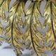 Large Italian sunburst wall mirror in gilded metal, 1960s-70s.