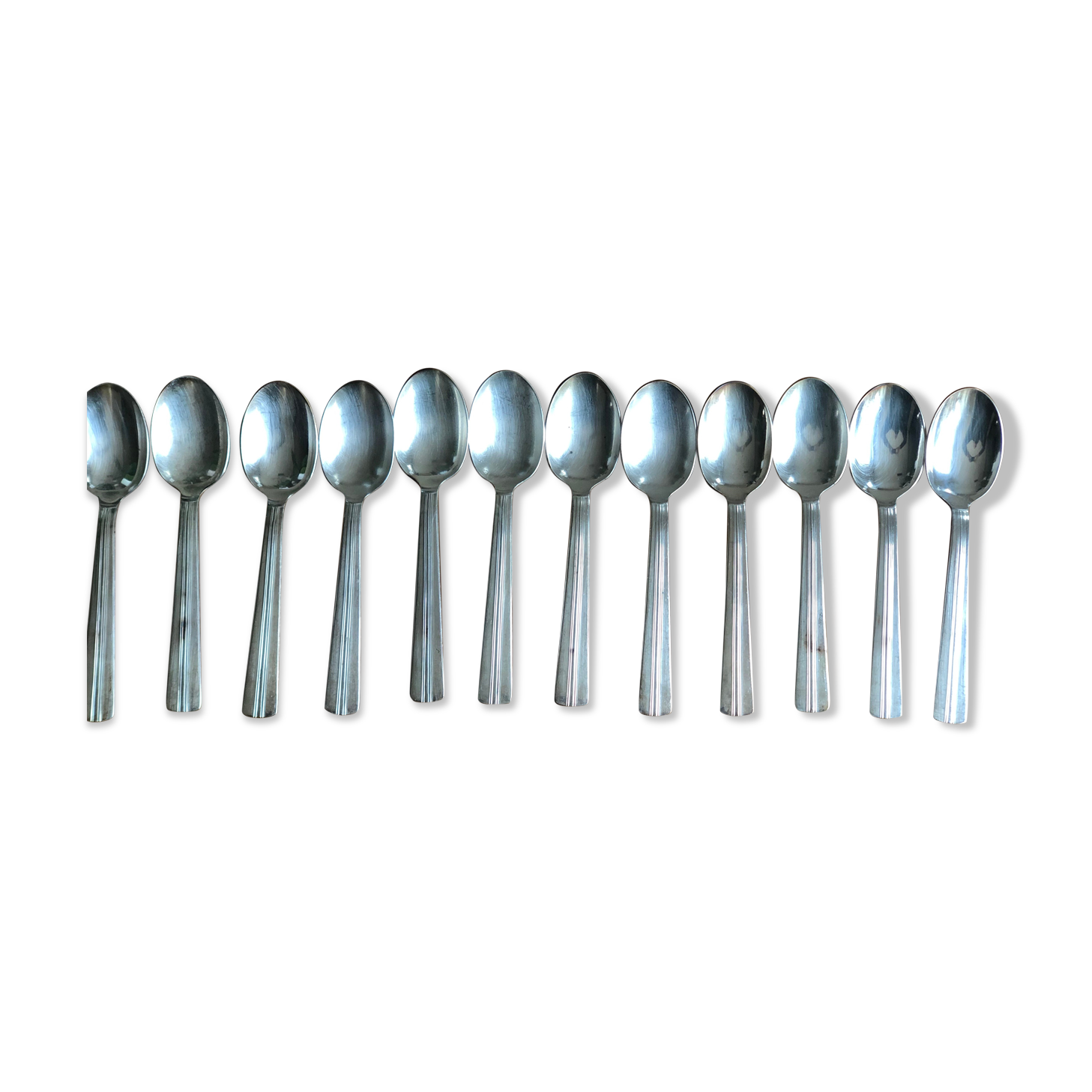 12 Soup spoons Ercuis in silver metal