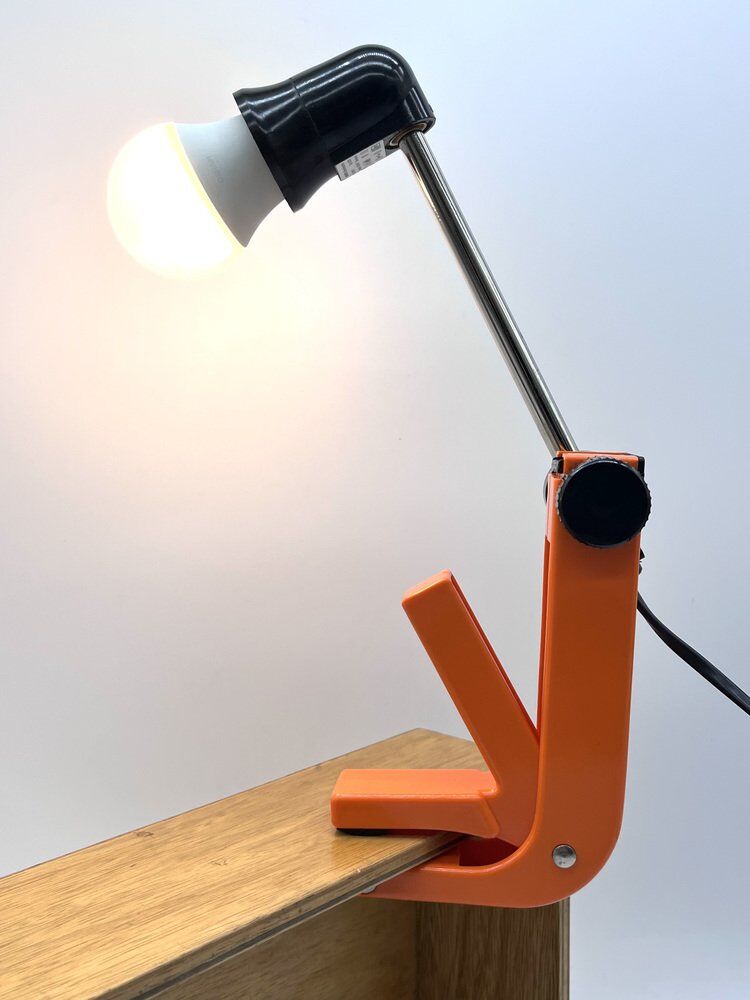 2 orange clamp lamps by revue, 1970