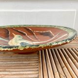 Decorative cut dish in terracotta
