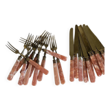 24-piece dessert service with pink mother-of-pearl handles.