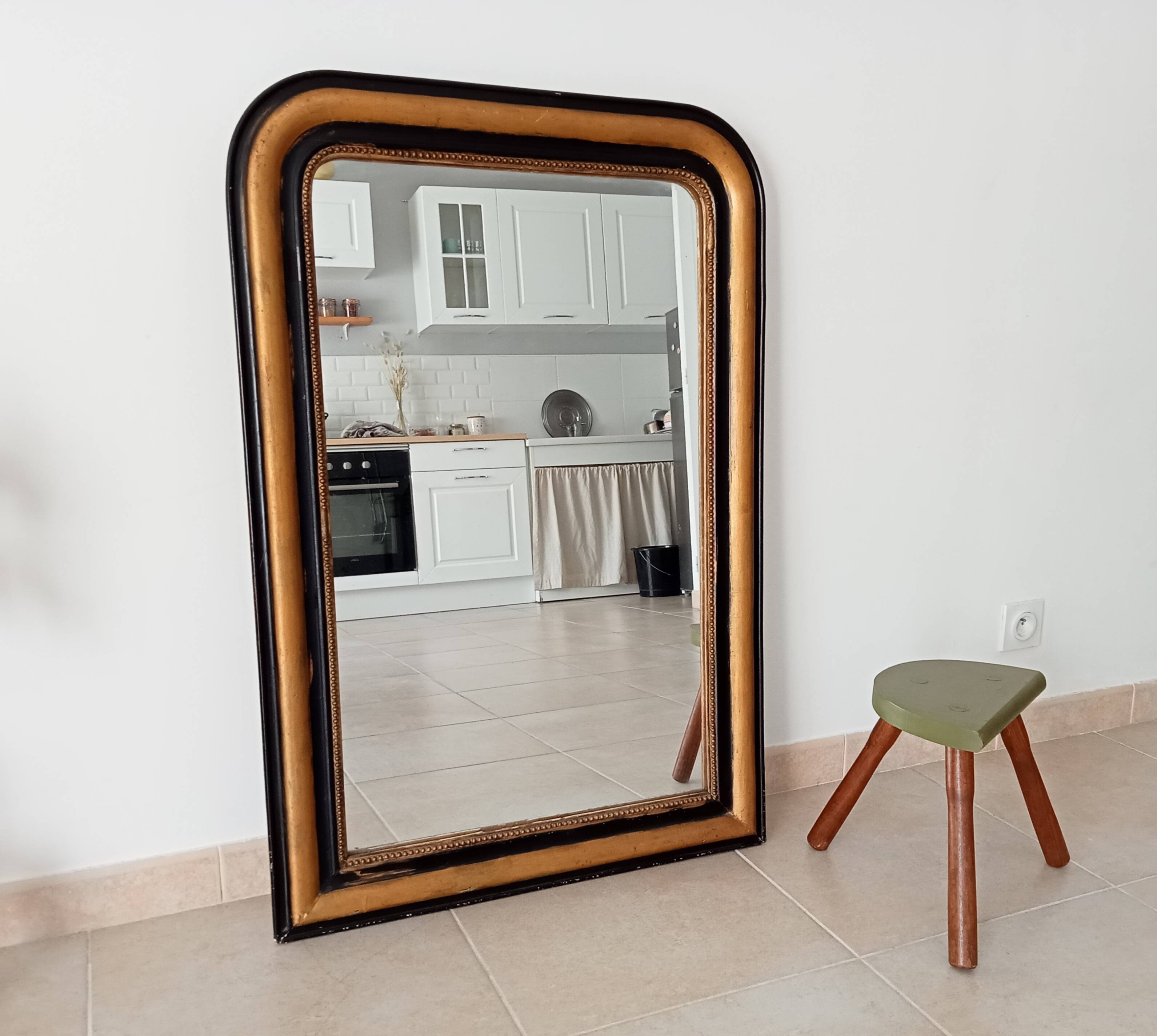 Louis Philippe mirror 105*71cm in wood and stucco 19th century