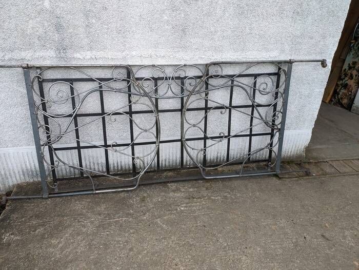 Metal folding bed, wrought iron bench