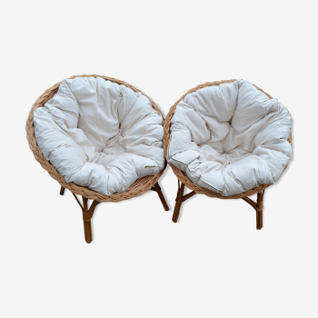 Pair of rattan armchairs with cushions