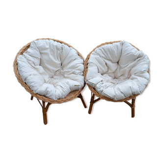 Pair of rattan armchairs with cushions