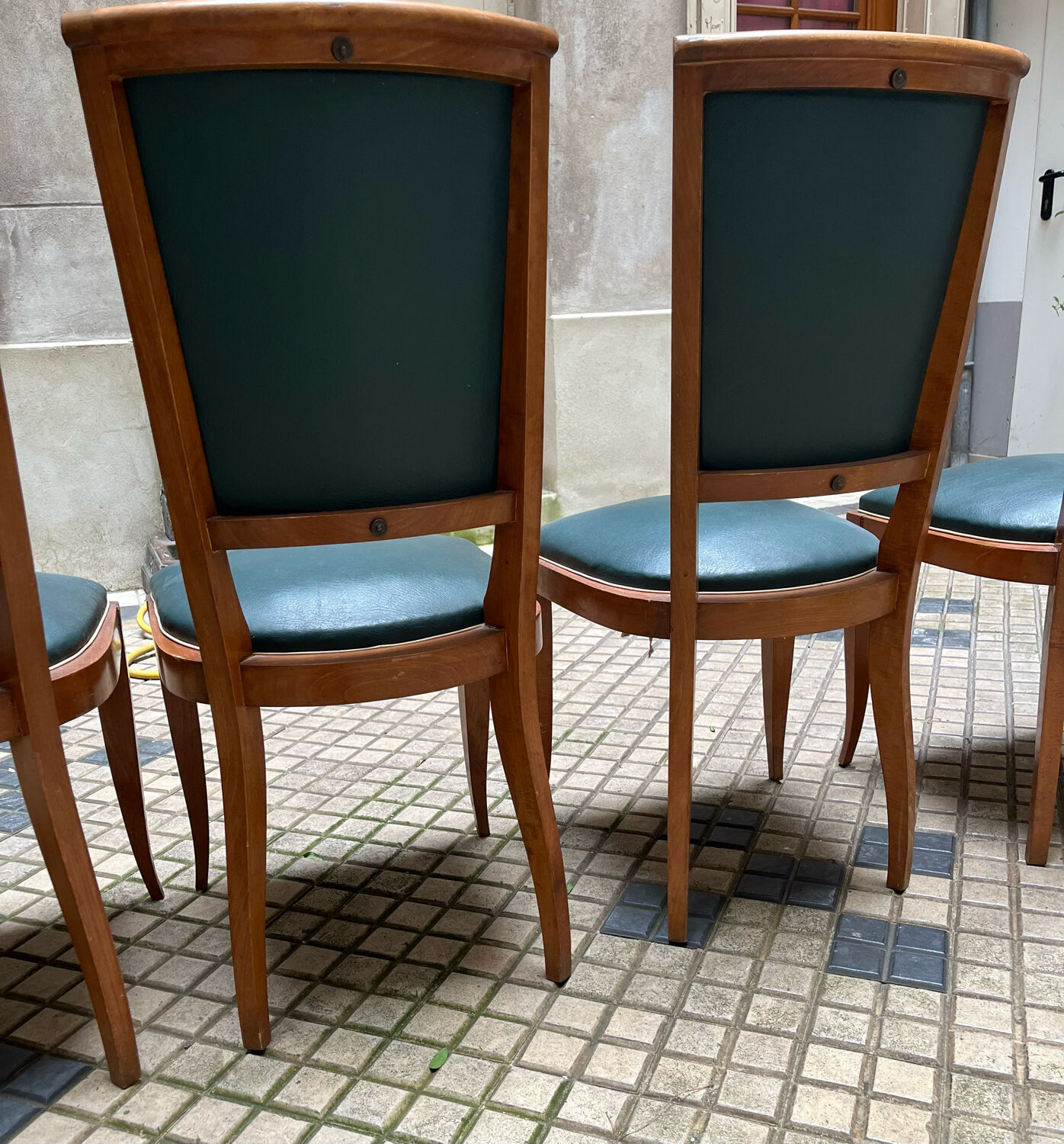 Green art deco chairs in skaï and wood