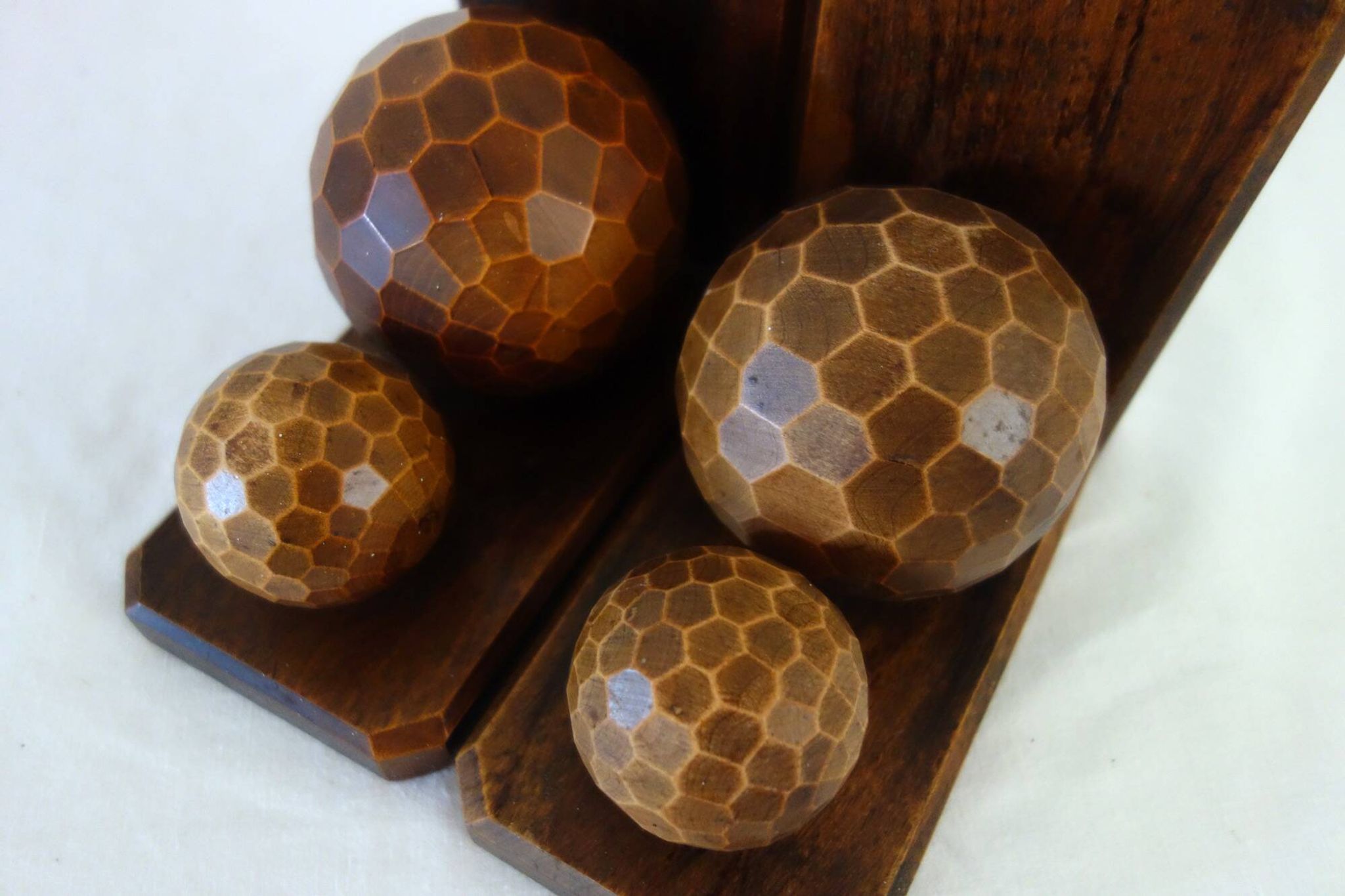 Pair of vintage wooden bookends with faceted balls
