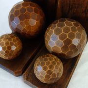 Pair of vintage wooden bookends with faceted balls