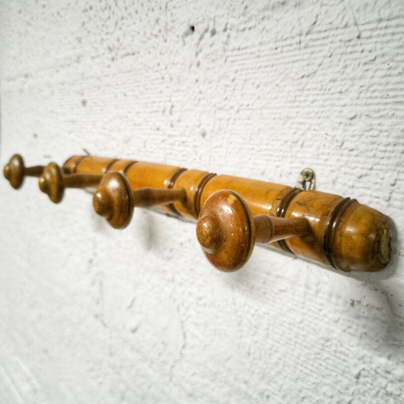 Turned wooden coat rack