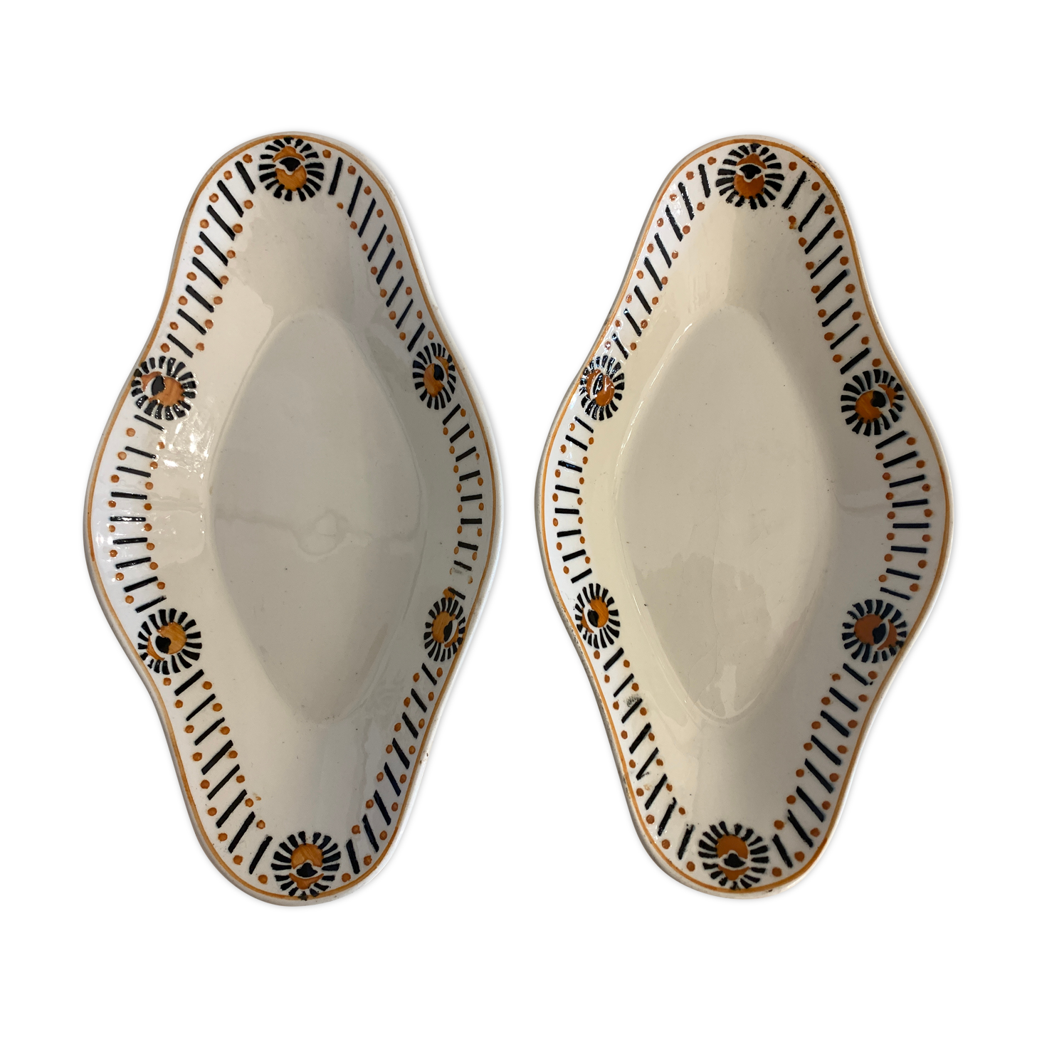 Pair of art deco raviers signed Longwy and numbered, model Gerazine