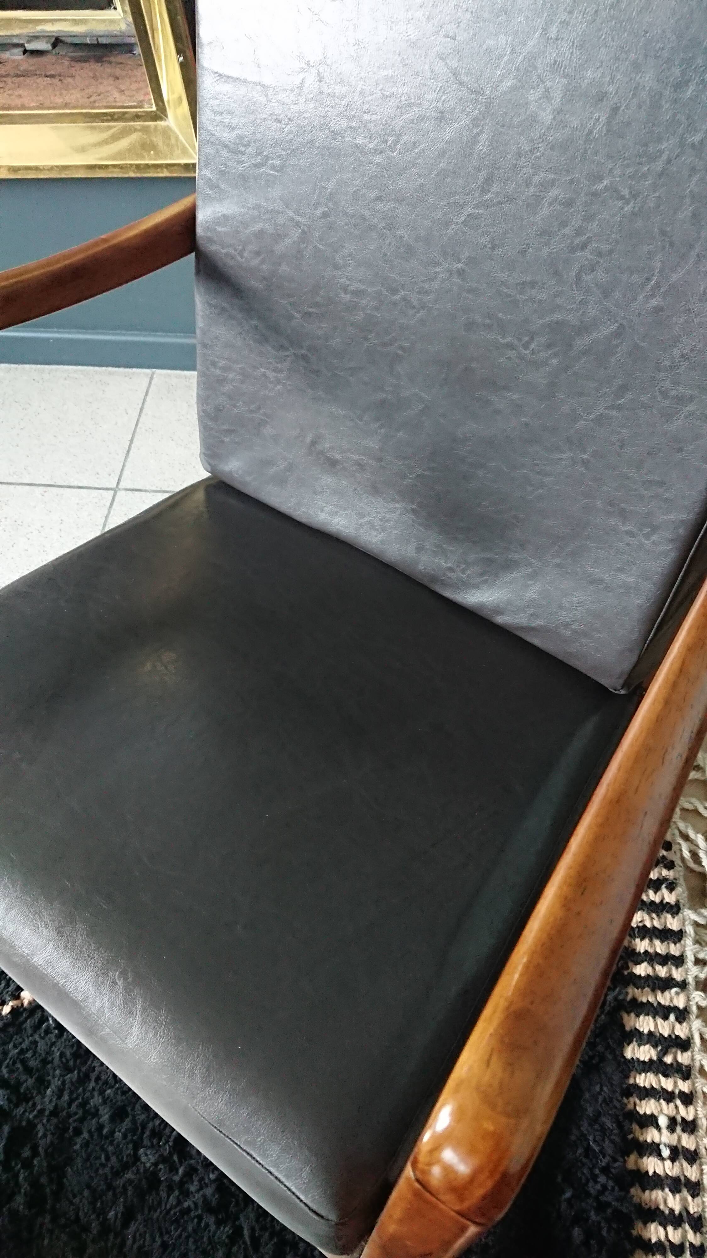 Rocking-chair in teak and skai