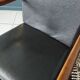 Rocking-chair in teak and skai