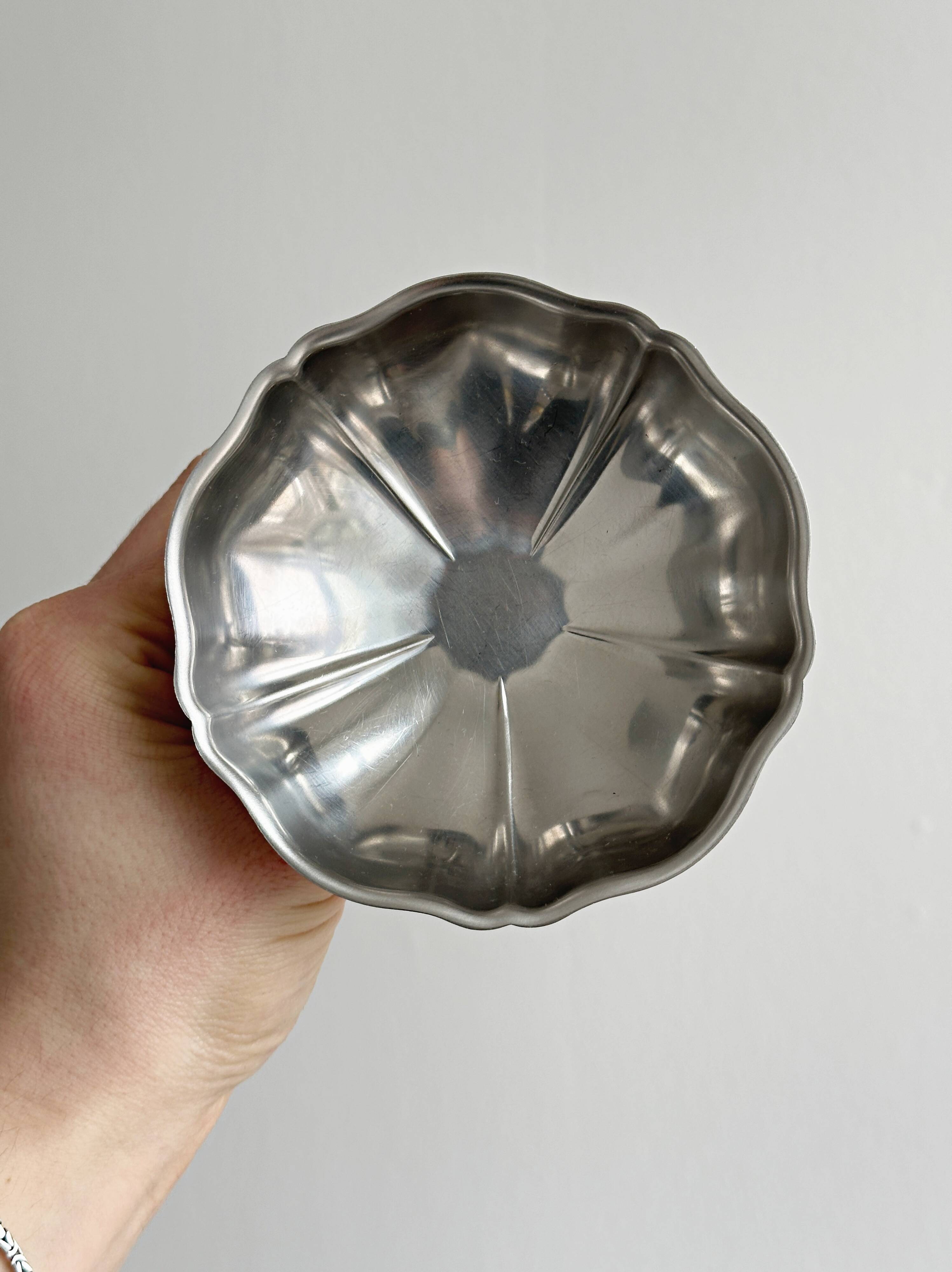 8 very large stainless steel footed bowls