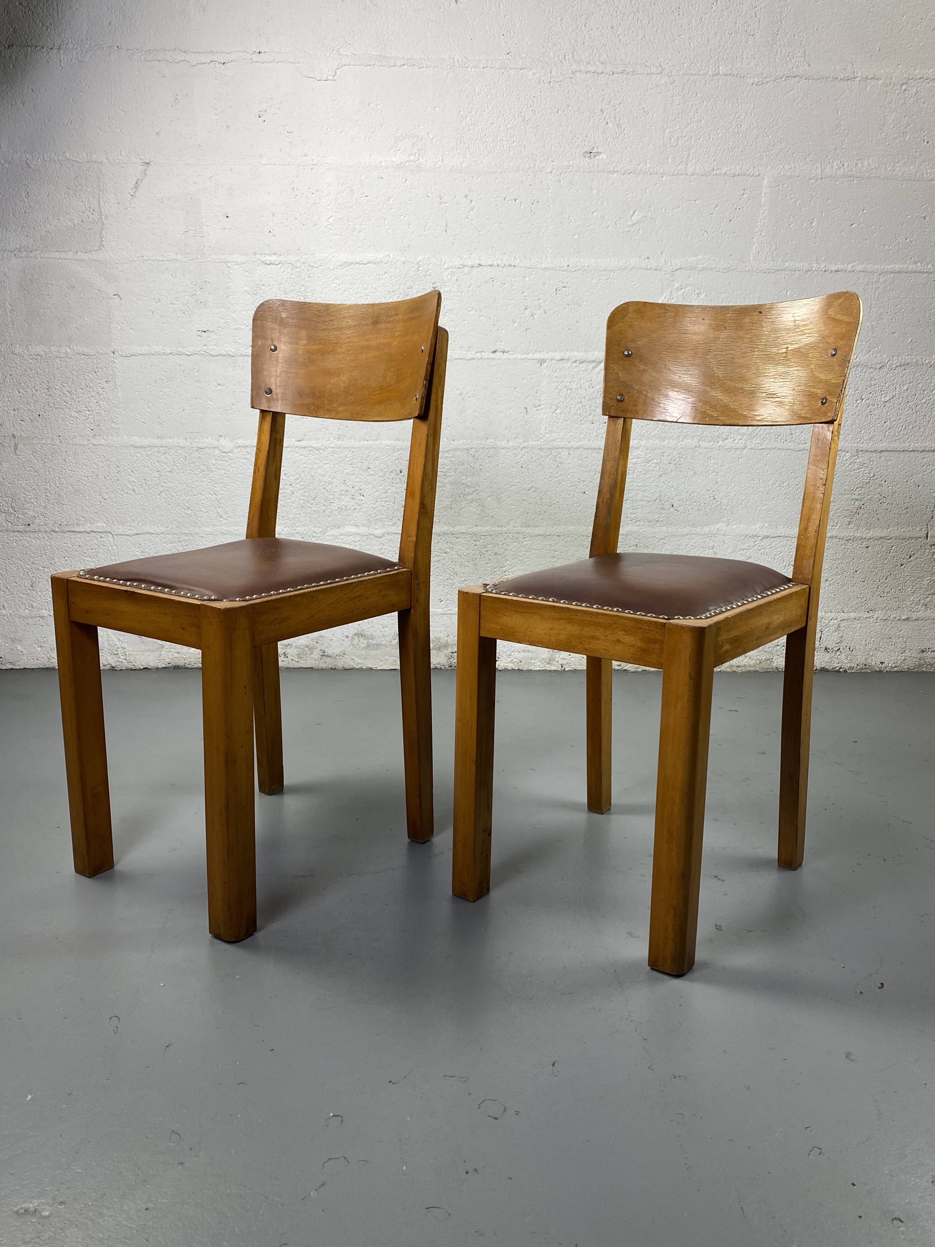 Wooden and leather chairs