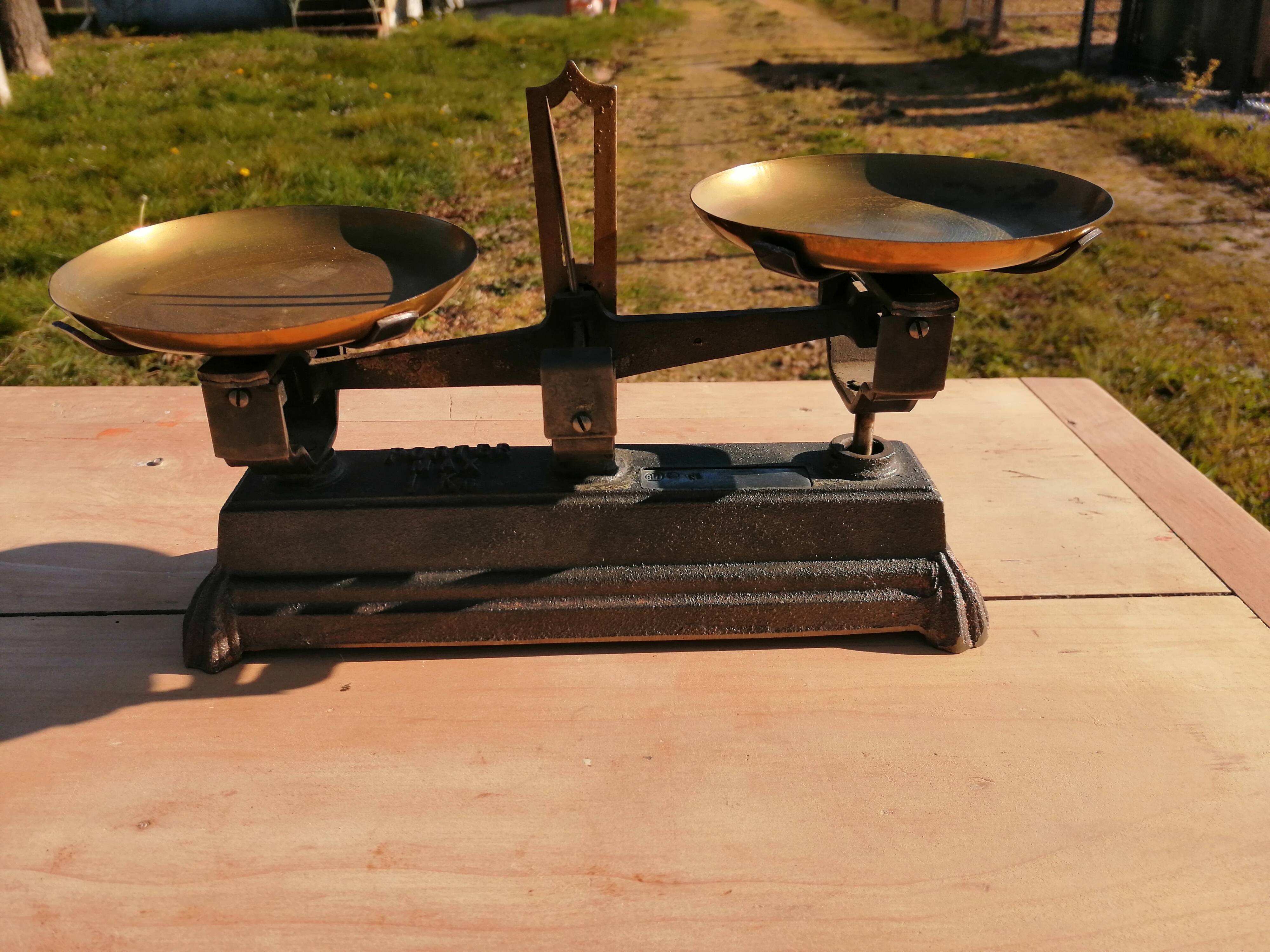 Old scale with weight