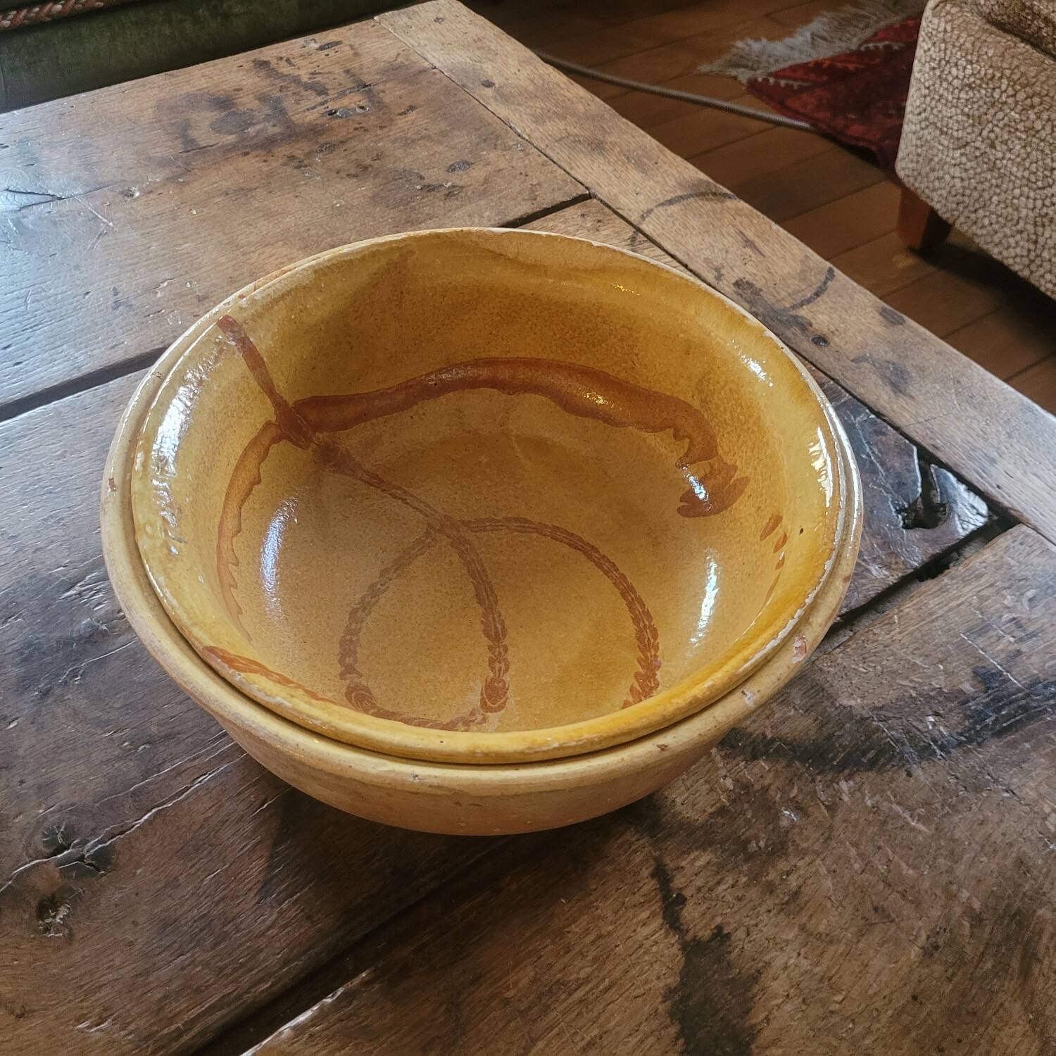 Two rustic glazed earthenware salad bowls, French craftsmanship, circa 1