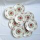 Assiettes plates vertes et bordeaux des années 50's