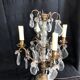 Golden brass girandole - 4 arms of lights - stamps and fleurettes in cut crystal