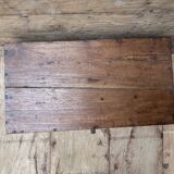 Teak chest from Burma with carved rosettes.