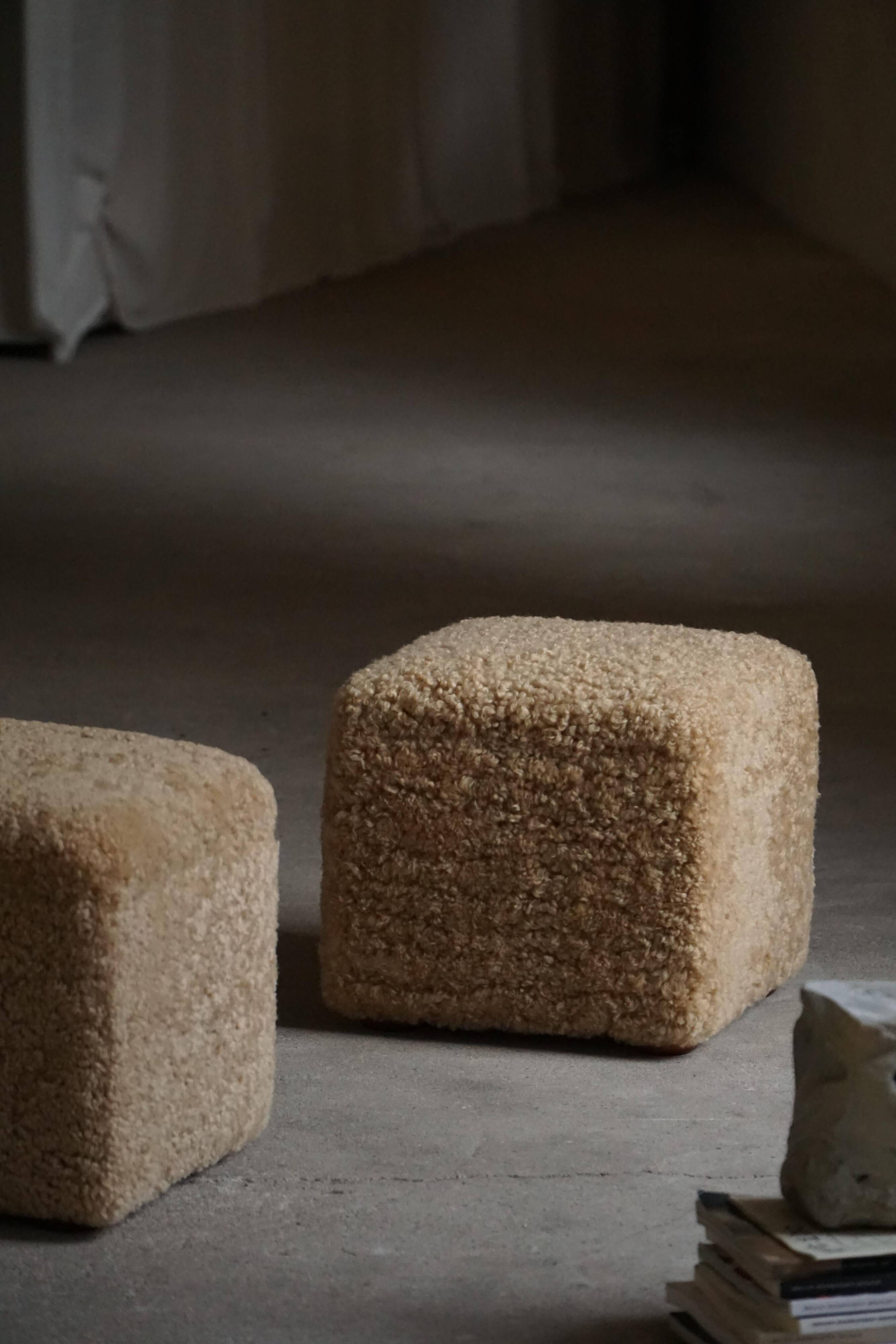 French mid-century cube poufs, a pair of lambswool stools, 1960s.