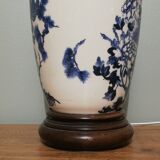 Ceramic lamp with Asian decoration with matching lampshade.