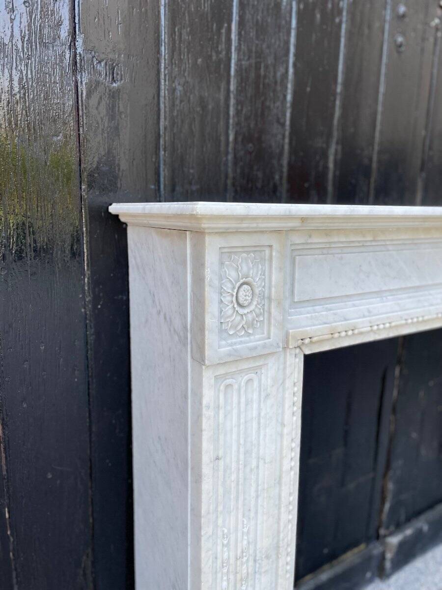 Louis XVI fireplace in Carrara marble