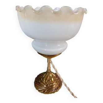 Golden bronze table lamp, white opaline globe with cream frills, art deco style