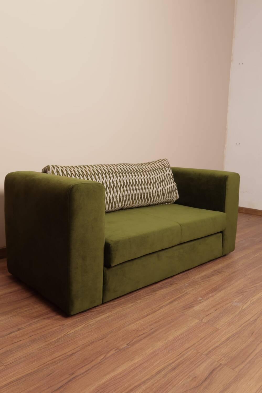 Olive velvet two-seater sofa
