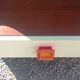 Pair of design bedside tables in orange resin rosewood with white melamine from the 70s