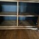 Sideboard made from recycled teak and metal legs