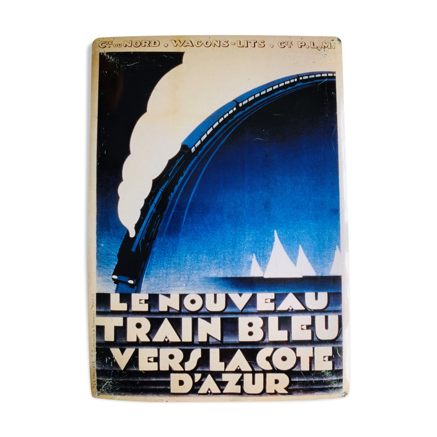 Plaque publicitaire pour le train bleu