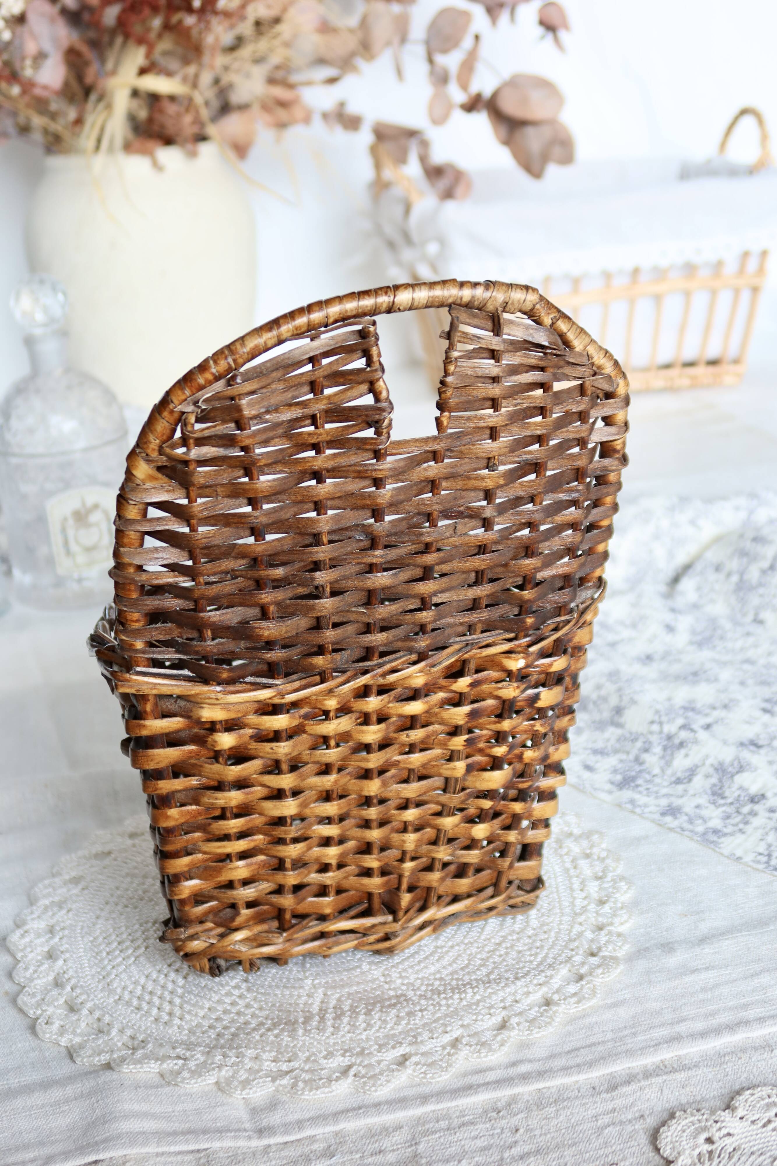 Vintage dark wicker wall basket