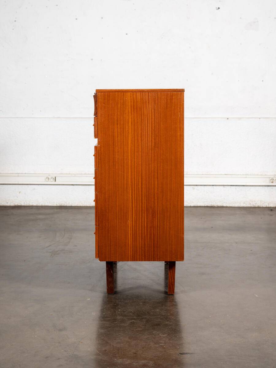 Large English teak chest of drawers