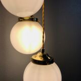 Three-light cascade suspension, vintage globes in white opaline