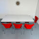 Large table design USM Haller with a white top and chrome structure.