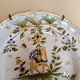Antique Moustiers plate hand-decorated with a horseman.