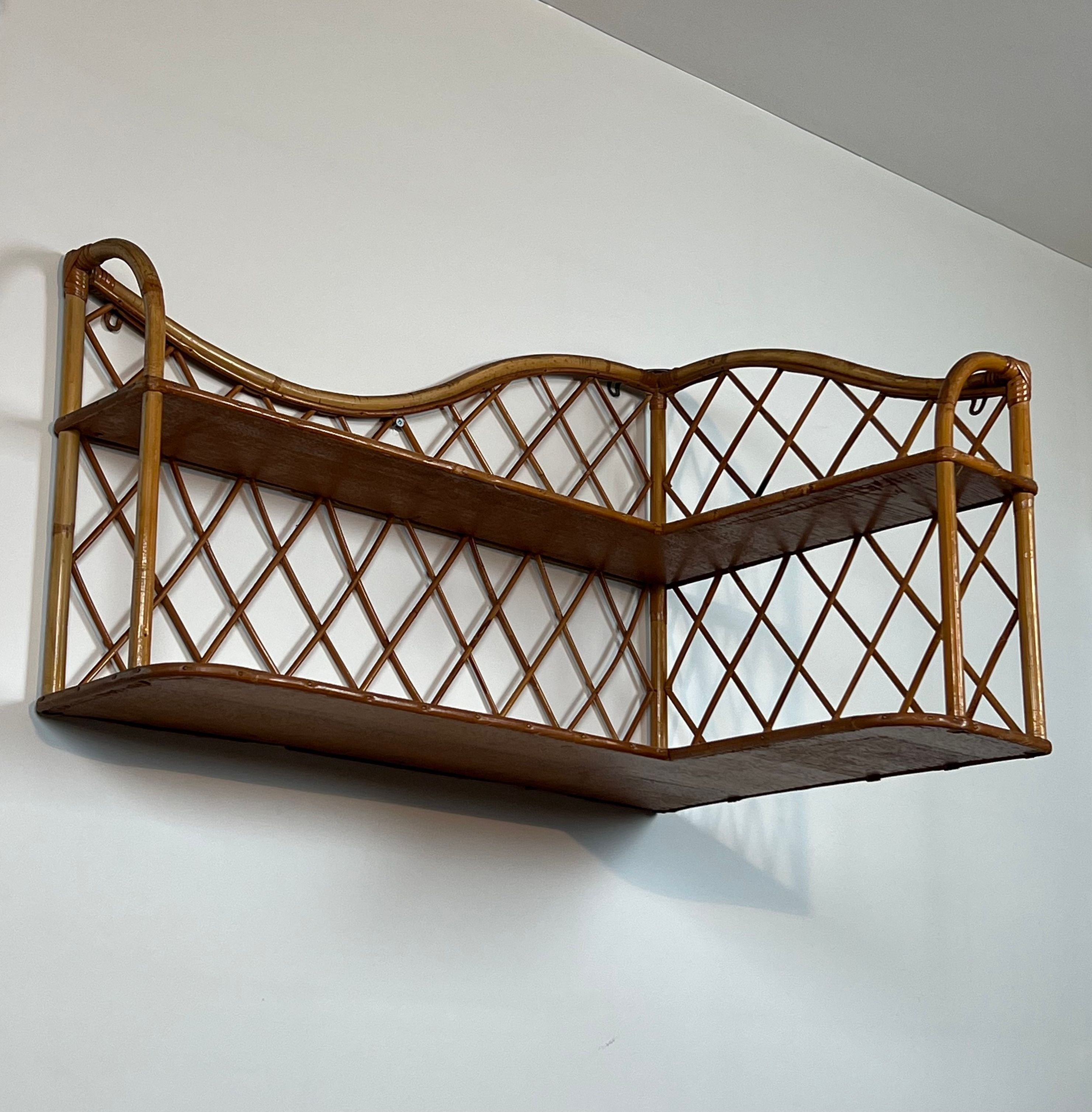 Corner wall shelf in rattan attributed to Audoux-Minet.