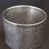 Un encrypted silver metal towel ring
