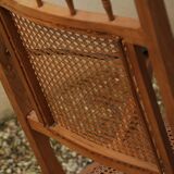 19th-century caned chaise longue in colonial style