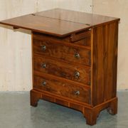 Vintage walnut commode with sliding top in Butler style.