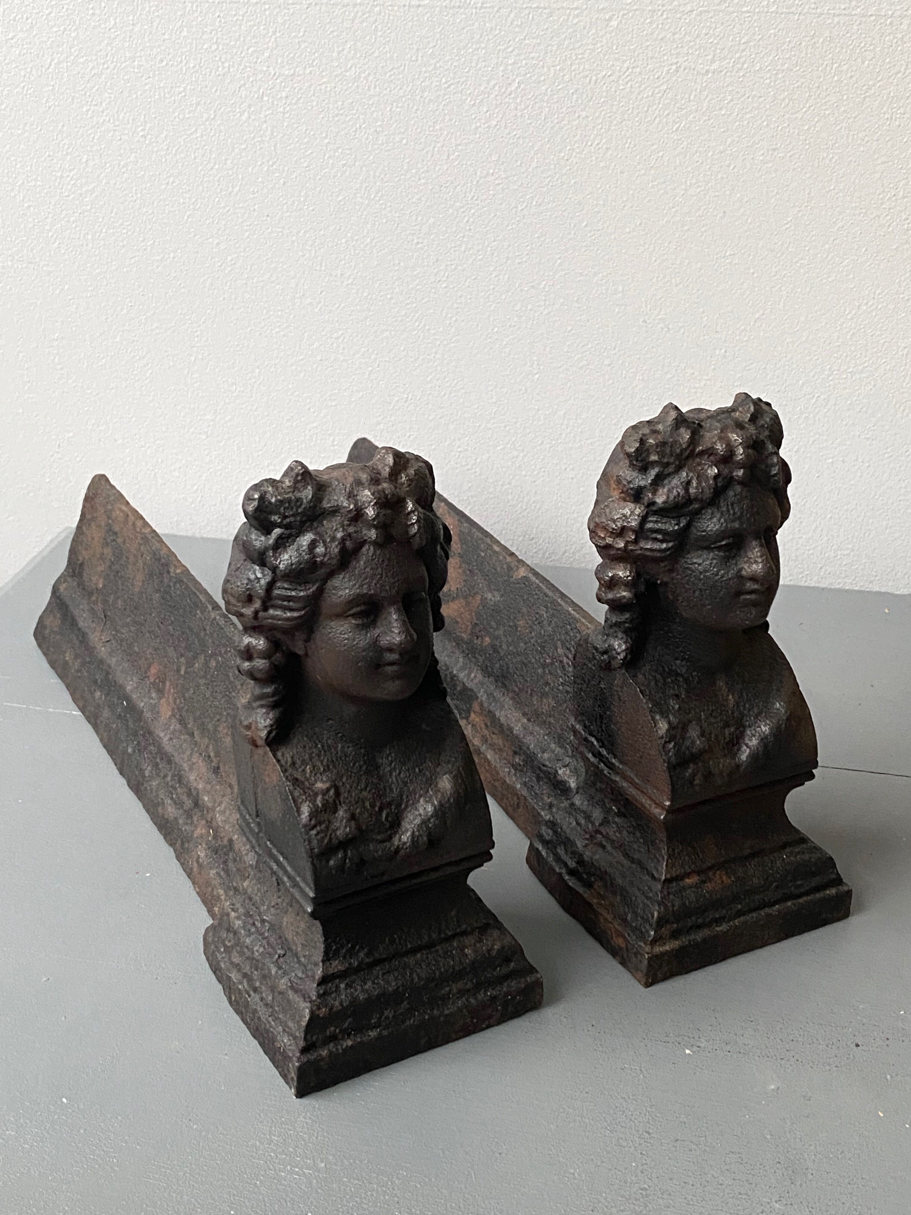 Pair of cast iron pegs