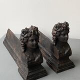Pair of cast iron pegs